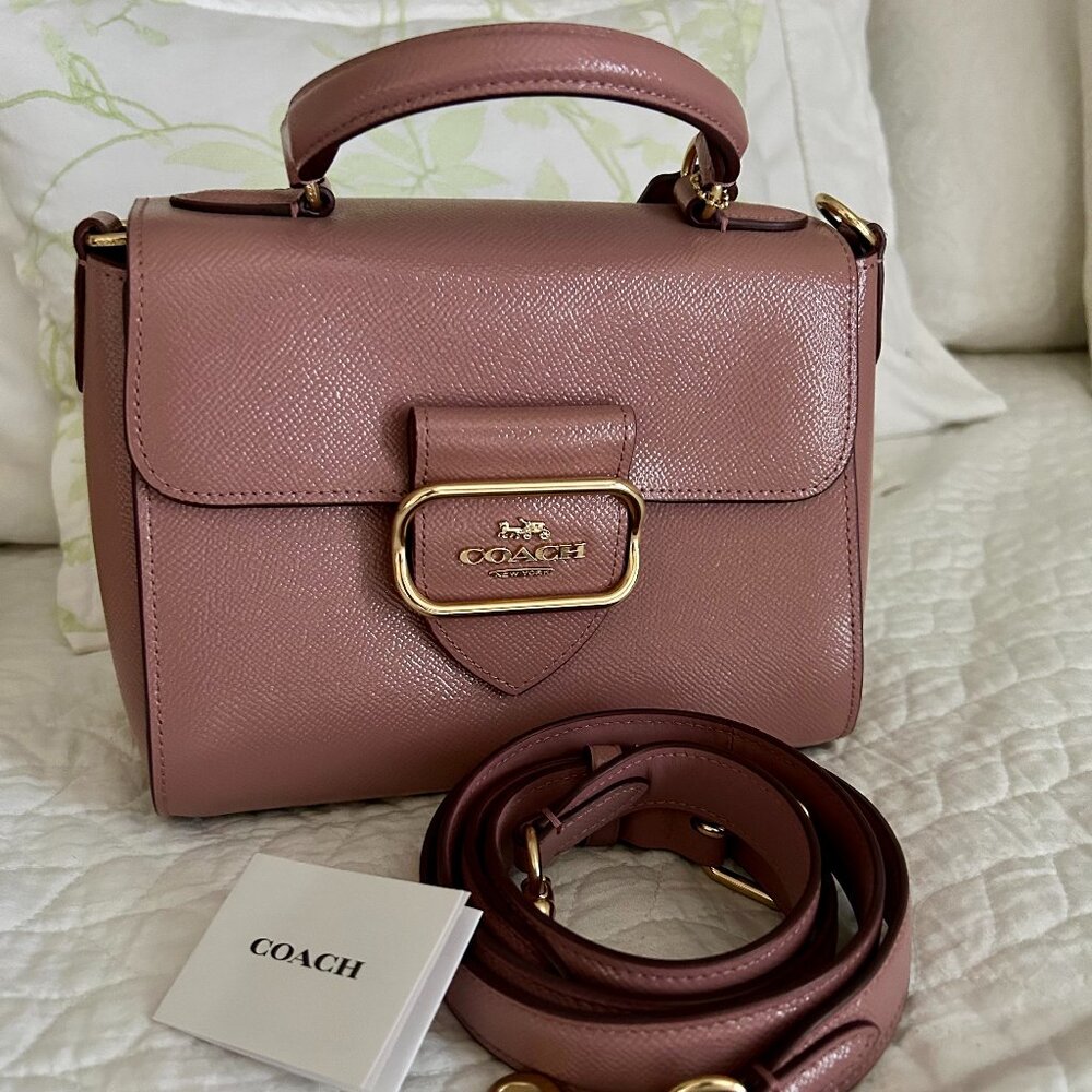SOLD. New Coach bag in a nude pink that matches everything.